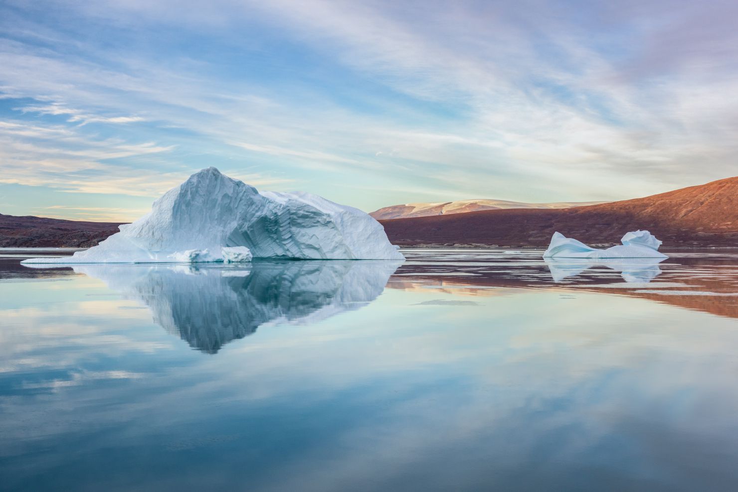 Icebergs in Rypefjord at sunrise